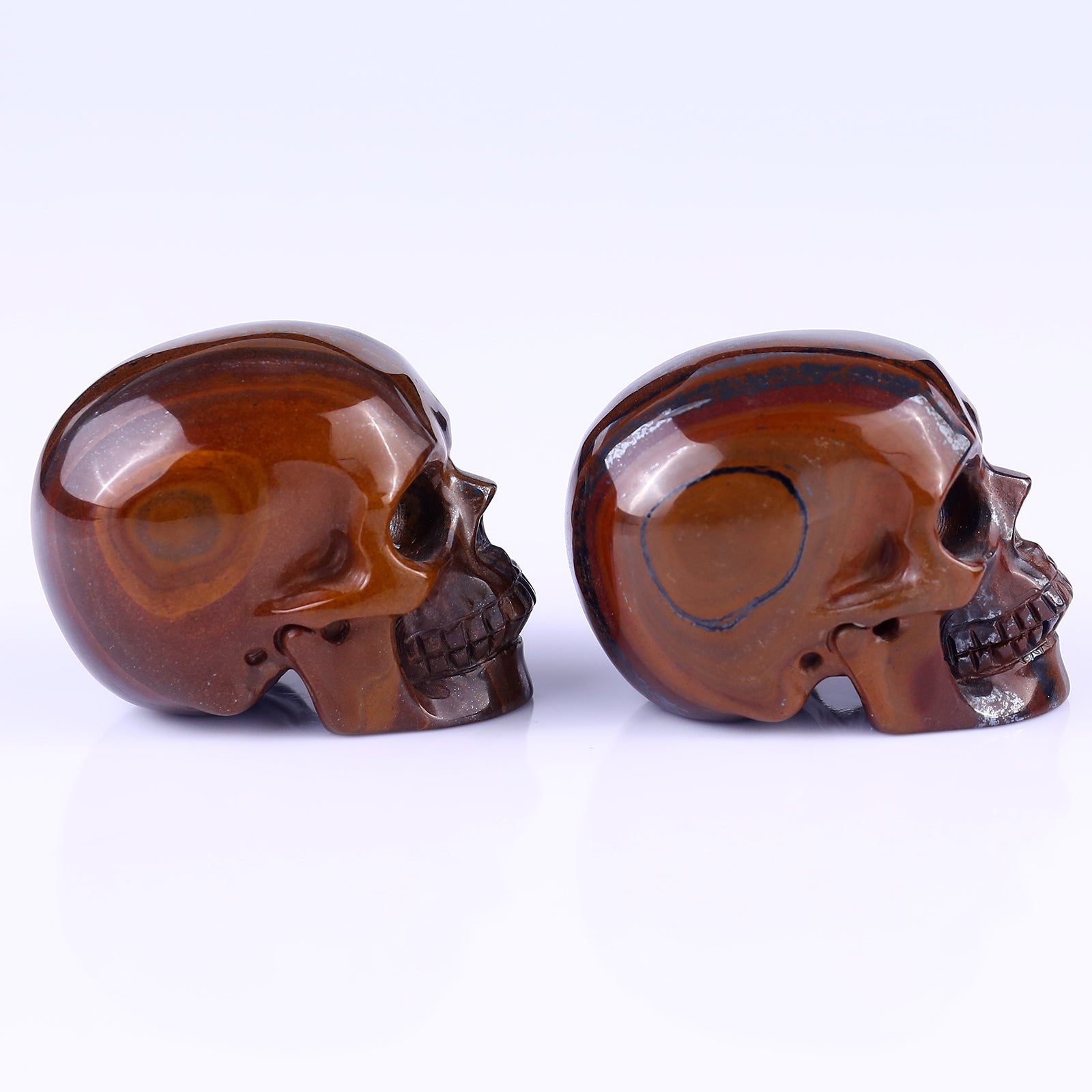 2.2" Tiger Iron Eye Hand Carved Crystal Realistic Skull Sculpture Crystallumi