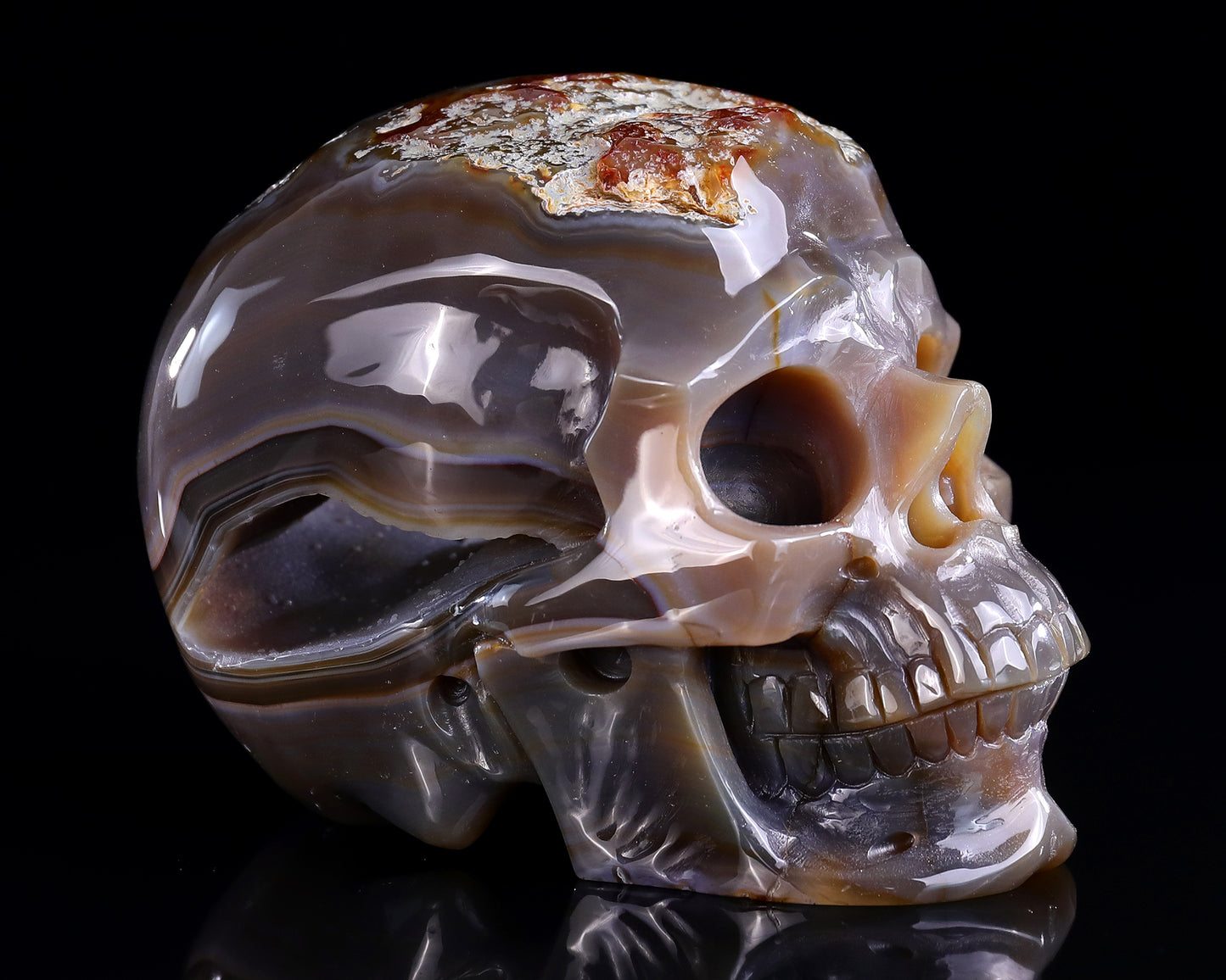 6.1" Red Chalcedony Hand Carved Crystal Geode Skull Sculpture