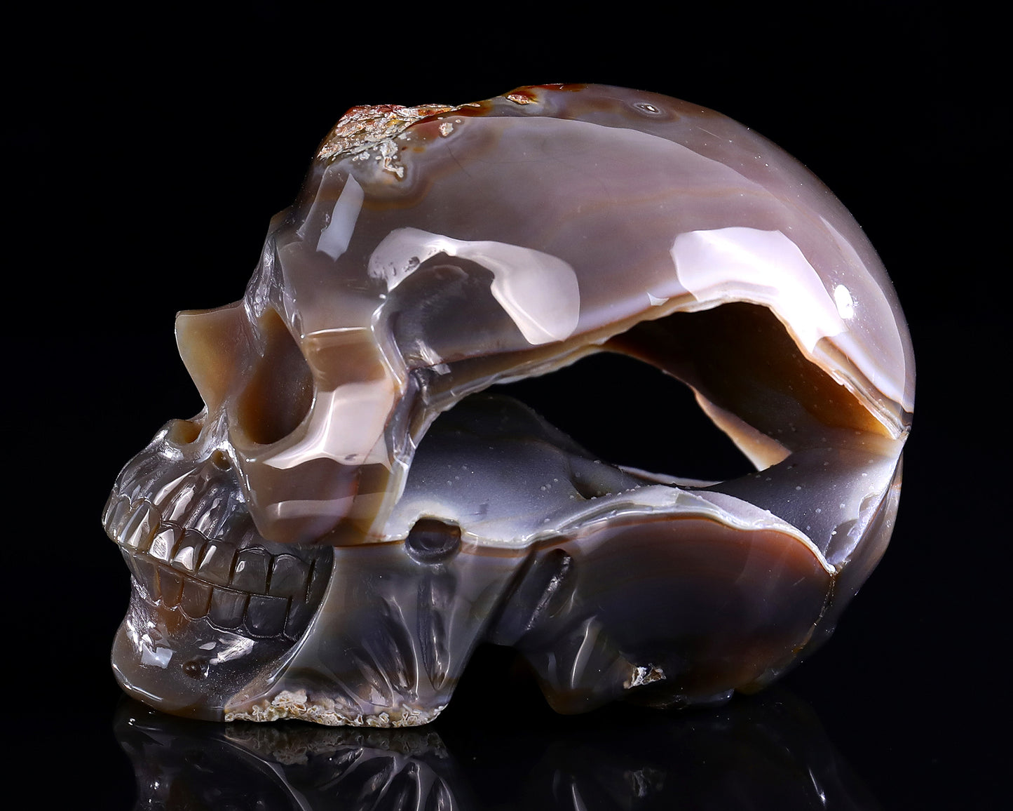 6.1" Red Chalcedony Hand Carved Crystal Geode Skull Sculpture