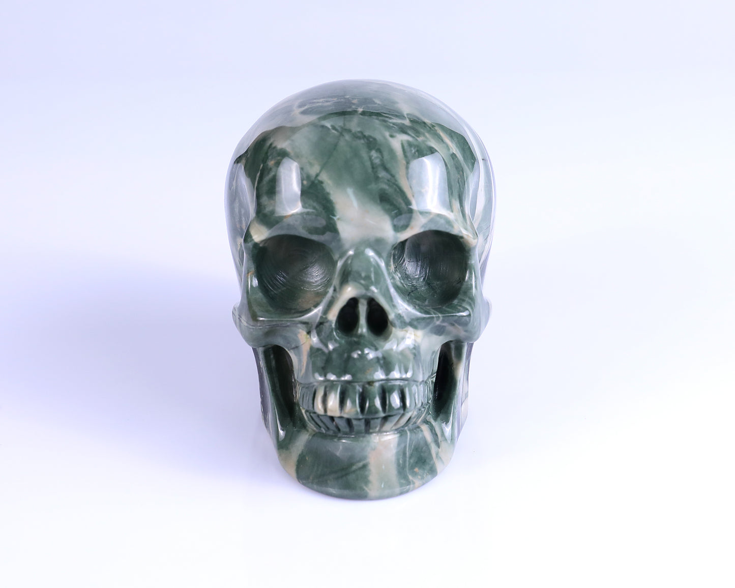 4.3" Jiulong Jade Hand Carved Crystal Realistic Skull Sculpture