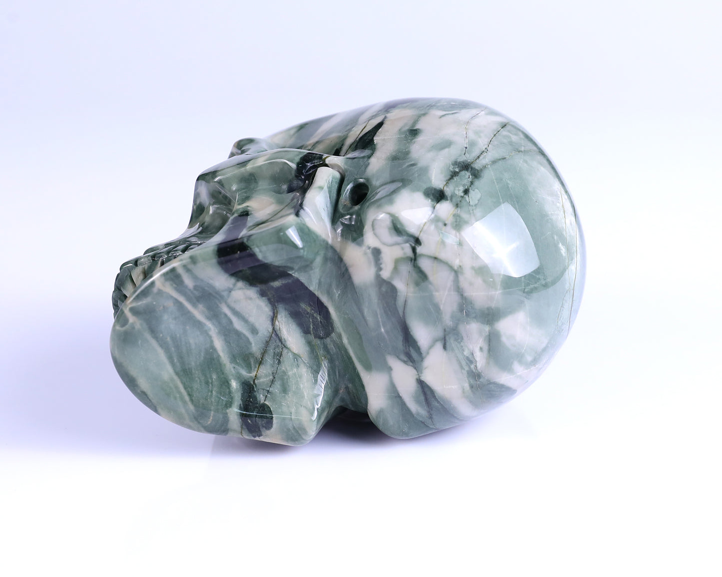 4.3" Jiulong Jade Hand Carved Crystal Realistic Skull Sculpture