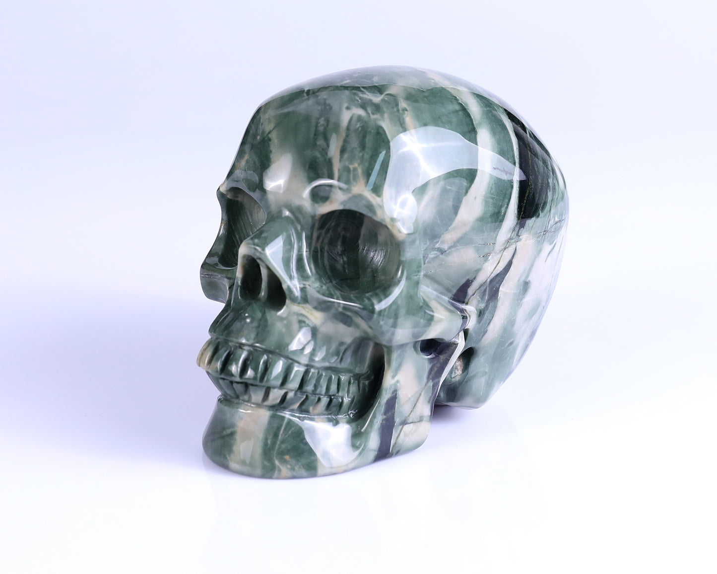 4.3" Jiulong Jade Hand Carved Crystal Realistic Skull Sculpture