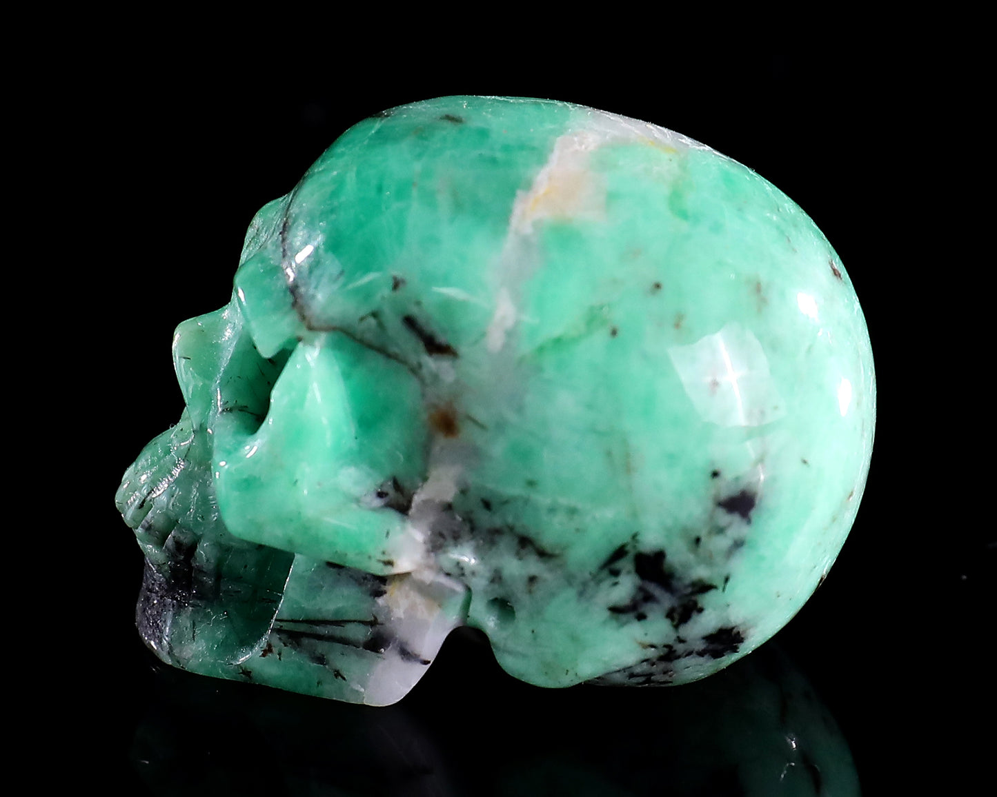 1.6" Emerald Hand Carved Crystal Realistic Skull Sculpture