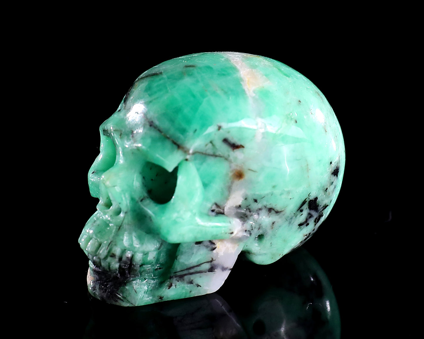 1.6" Emerald Hand Carved Crystal Realistic Skull Sculpture