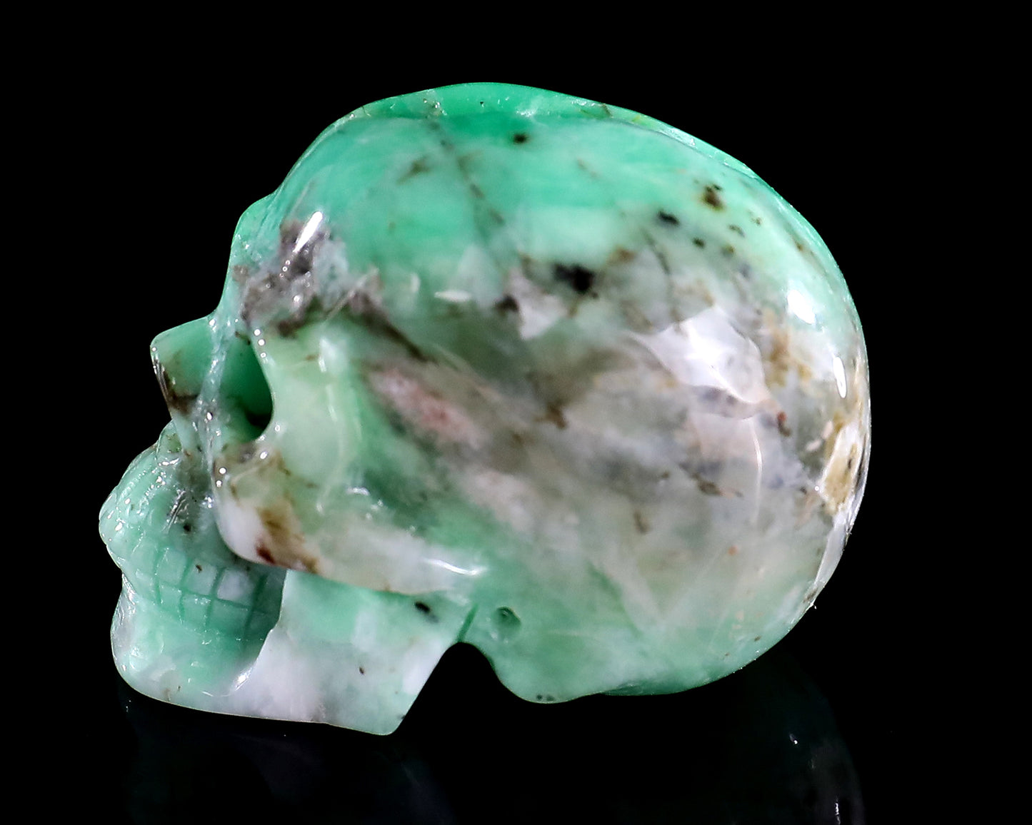 1.4" Emerald Hand Carved Crystal Realistic Skull Sculpture