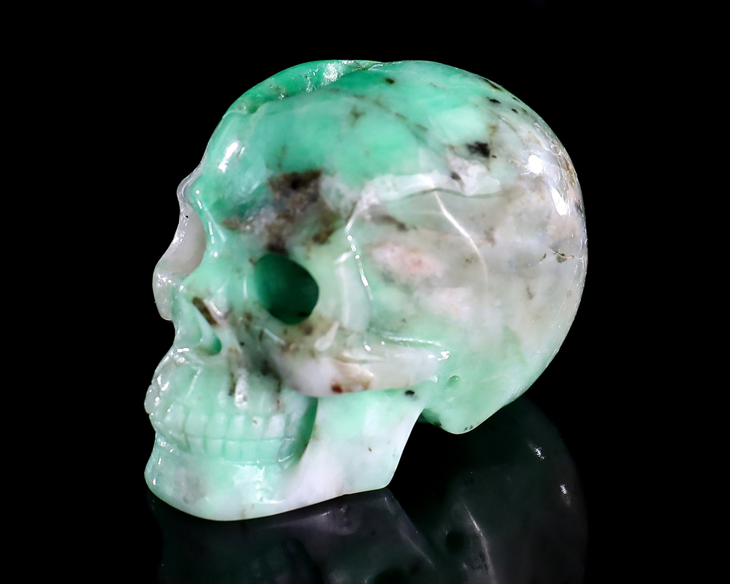 1.4" Emerald Hand Carved Crystal Realistic Skull Sculpture