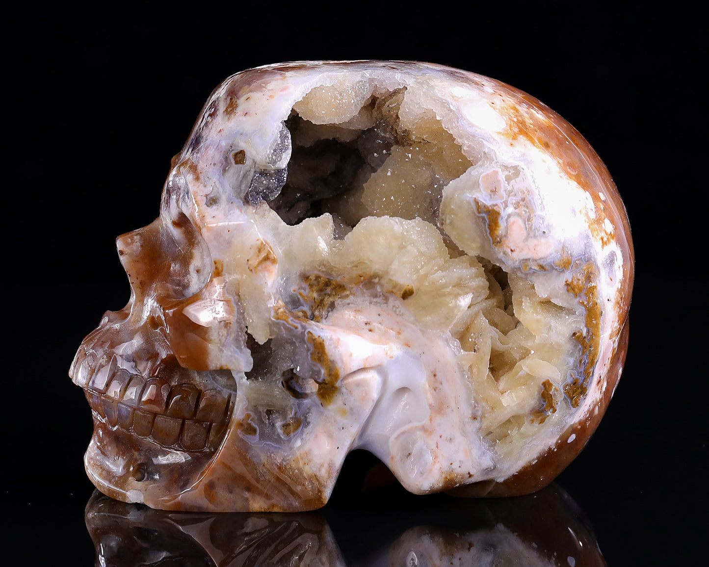 6.5" Chalcedony Hand Carved Crystal Geode Skull Sculpture