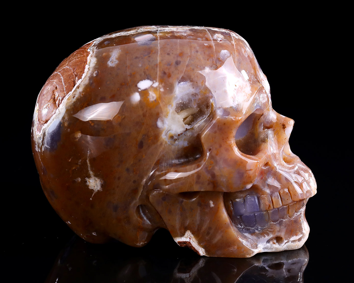 6.5" Chalcedony Hand Carved Crystal Geode Skull Sculpture