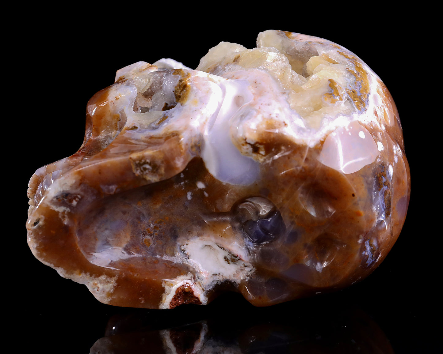 6.5" Chalcedony Hand Carved Crystal Geode Skull Sculpture