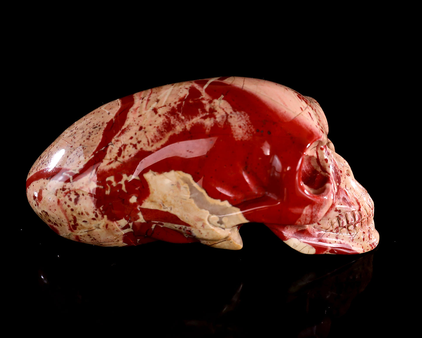 3.9” Natural Red Jasper Hand Carved Crystal Elongated Mayan Alien Skull Sculpture