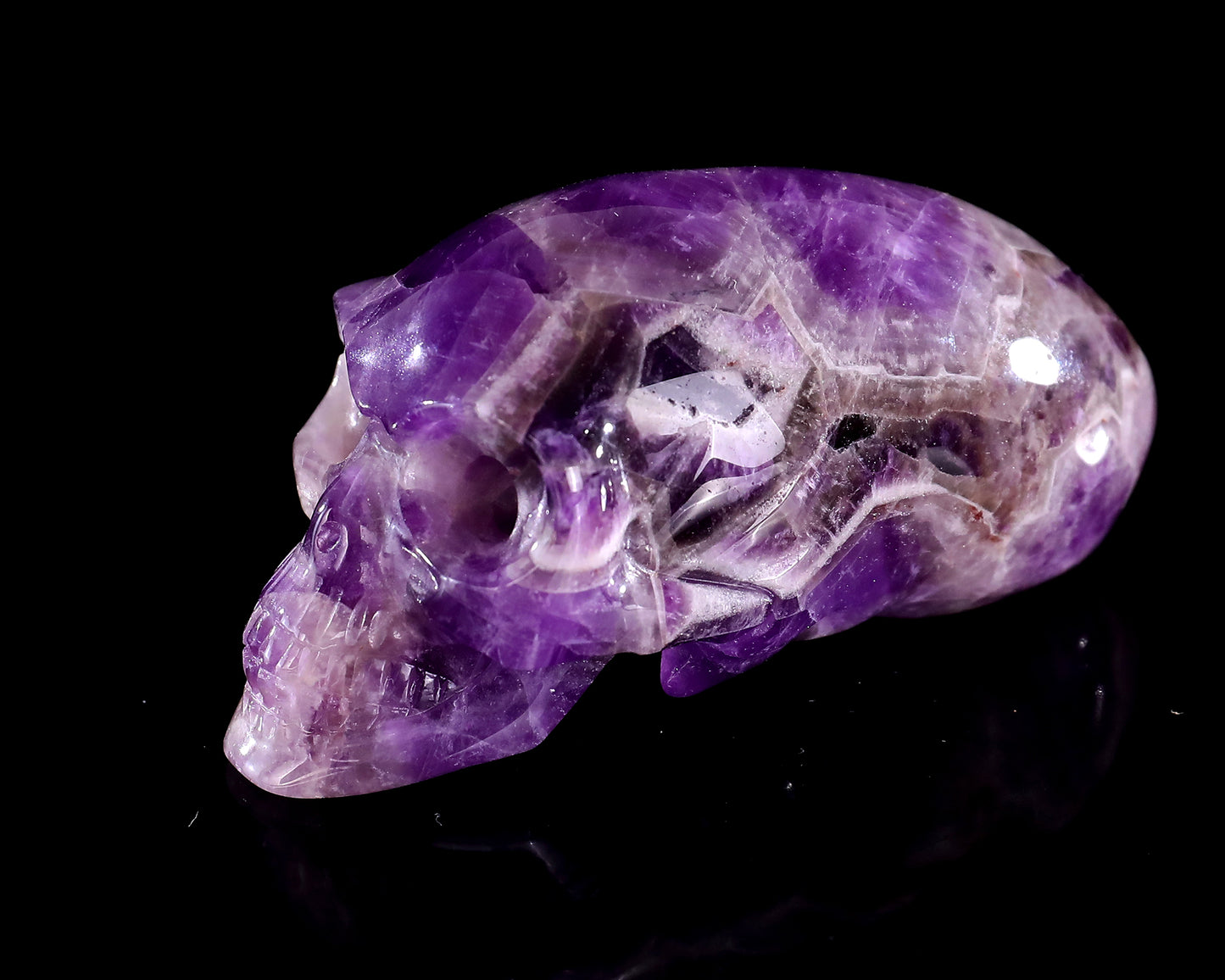 3.9” Natural Amethyst Hand Carved Crystal Elongated Mayan Alien Skull Sculpture